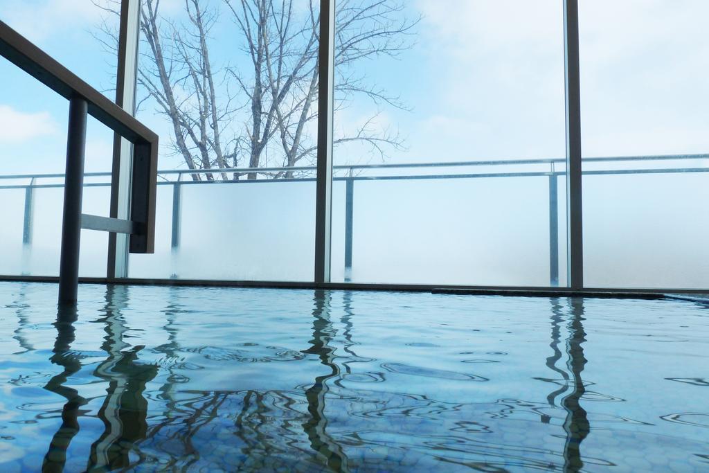 Shin Furano Prince Hotel Exterior foto A view of the indoor pool